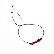 Huayruro thread bracelet