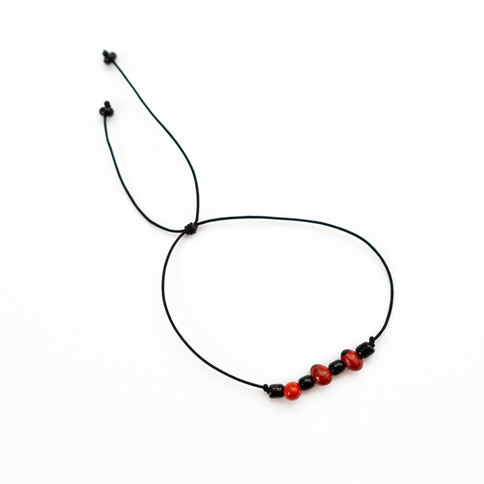 Pulsera hilo Huayruro