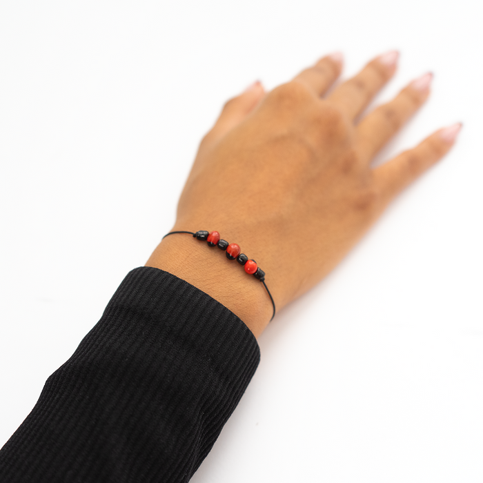 Pulsera hilo Huayruro