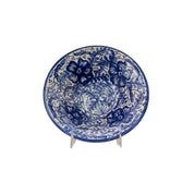 Plato azul cobalto con flores y hojas